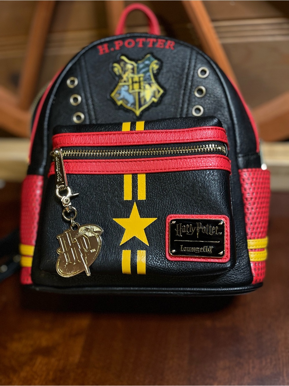NWOT Pristine Harry Potter Loungefly Backpack with Large Double Sided Charm